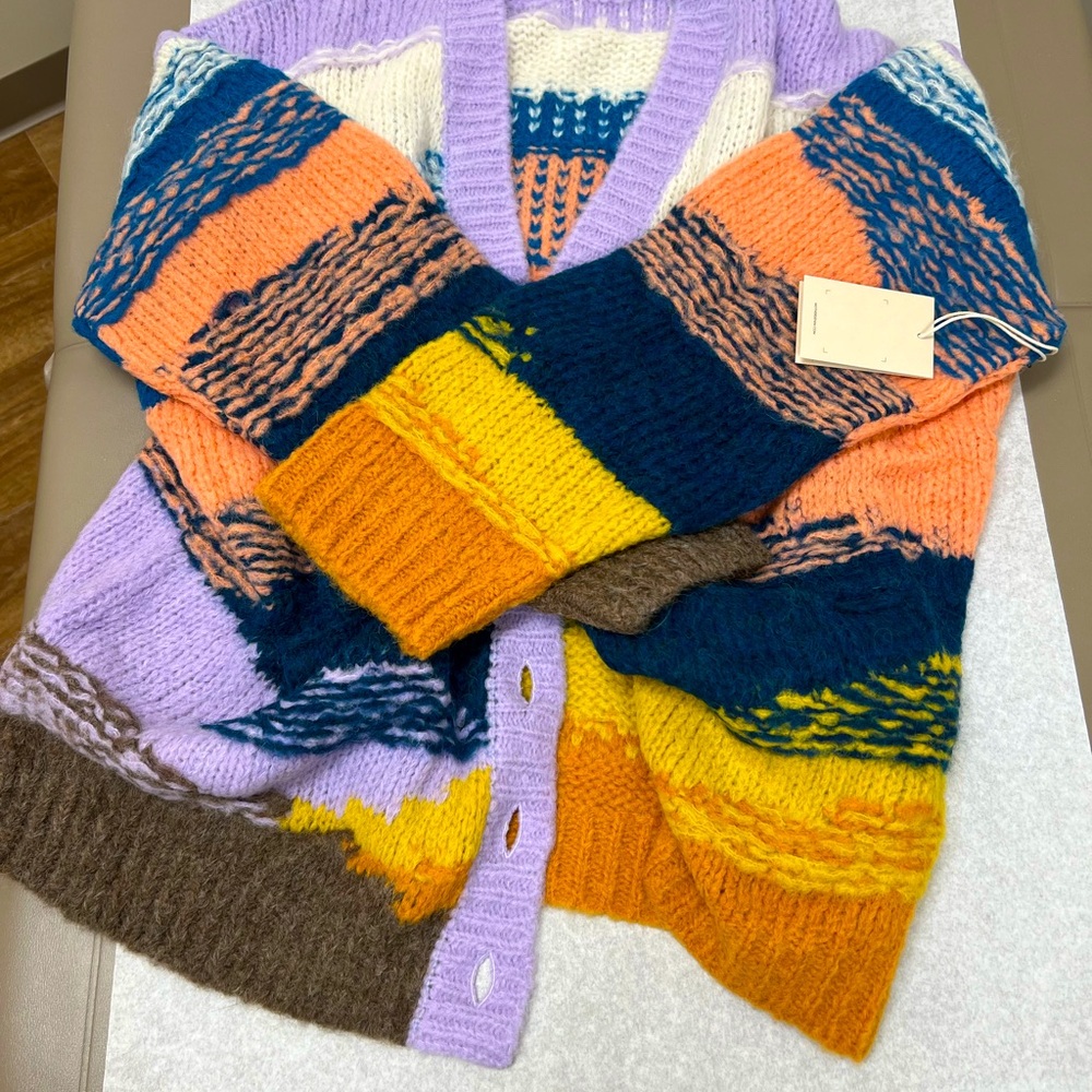 Mother sweater .   Never worn .  Tags on .